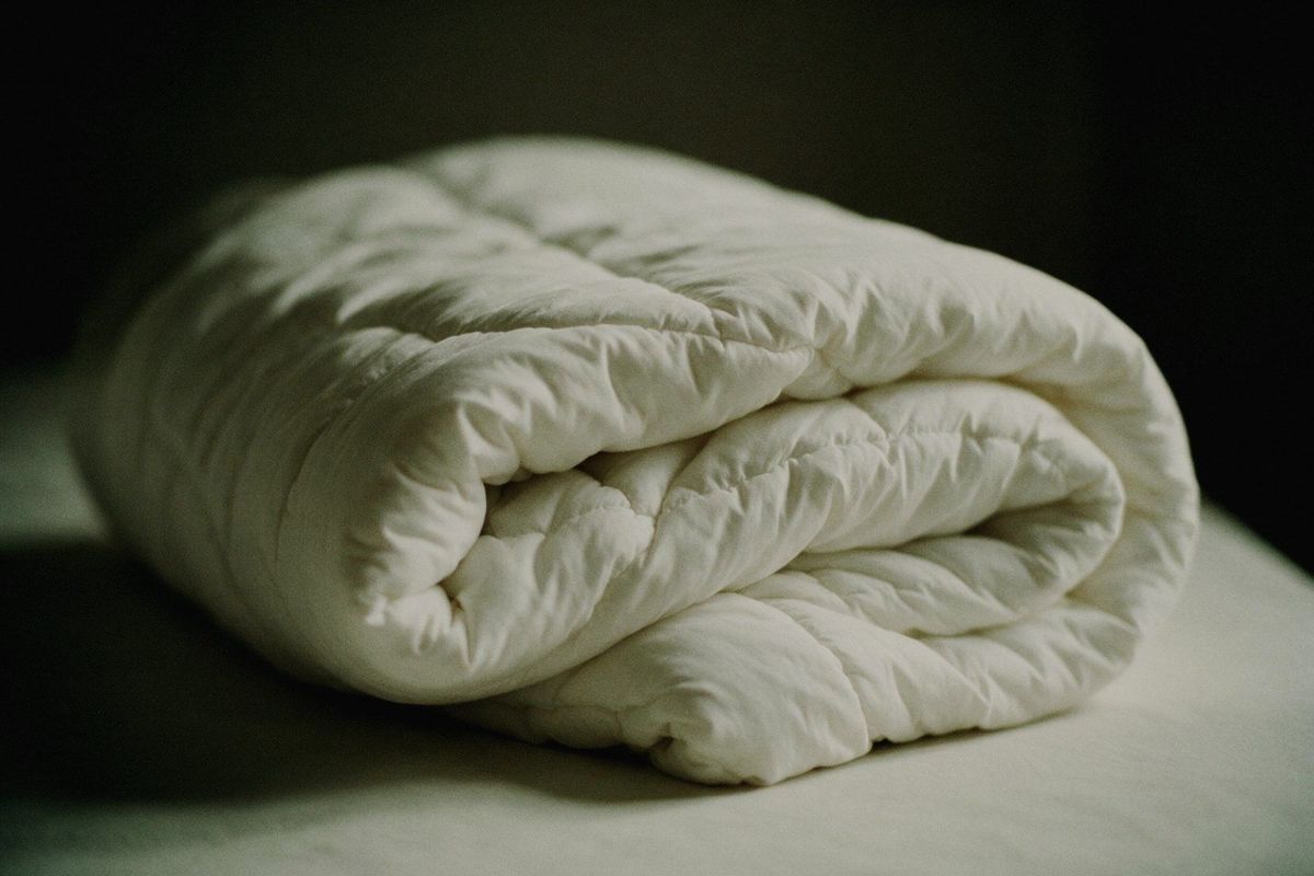 A folded comforter, washed in an oversize machine