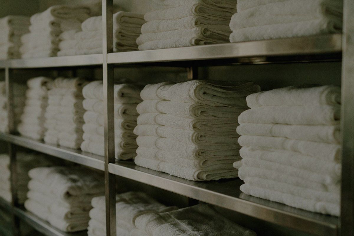 Folded commercial linen, laundered on a scheduled route