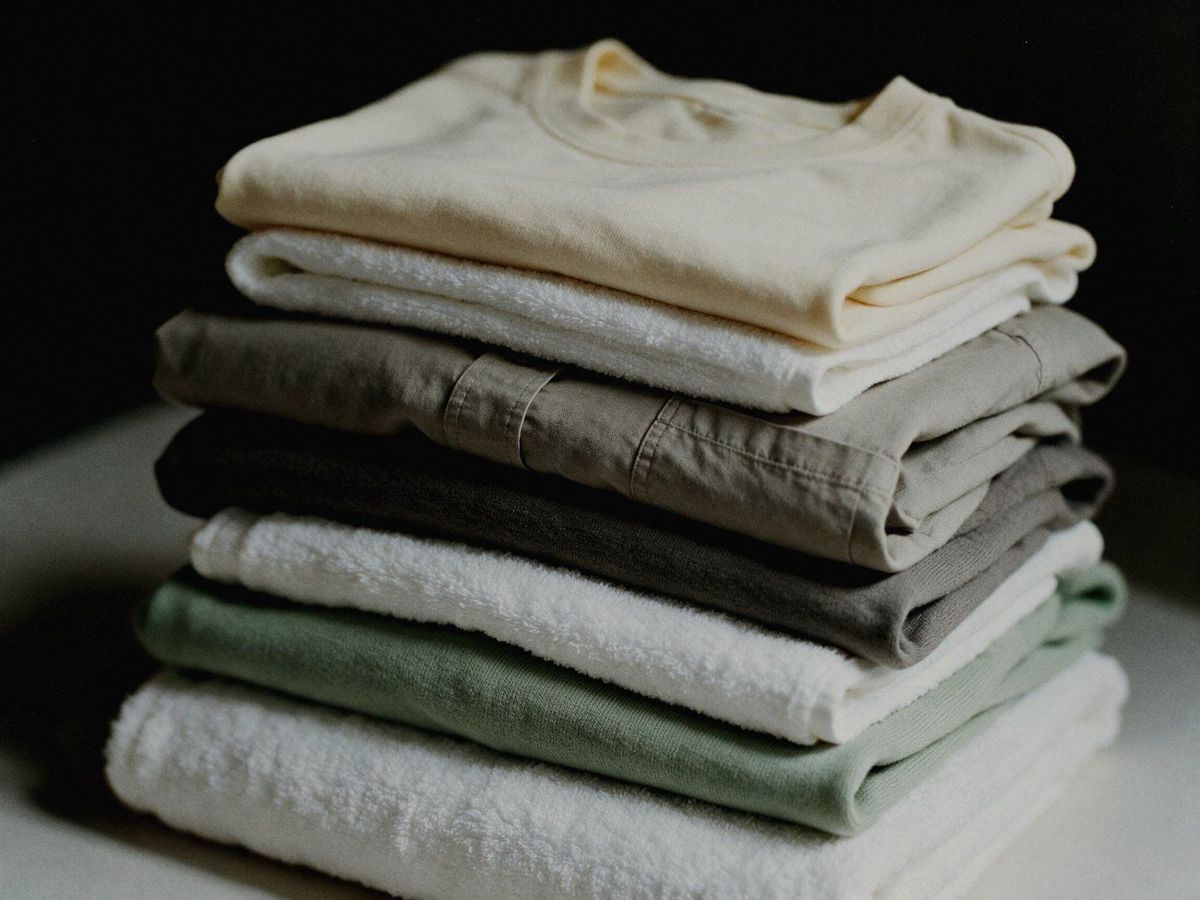A folded stack of clean laundry, ready for delivery